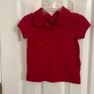 Two red polo shirt. New never worn.